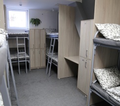 Спальное место на двухъярусной кровати в общем номере для мужчин в Okayhostel