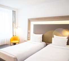 Номер Standard с двумя односпальными кроватями в Novotel Krasnoyarsk center