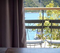 Двухместный номер Executive с видом на море двуспальная кровать в Meltemi Hotel