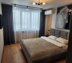 Апартаменты с красивым видом из окна в Апартаменты Loft 26 Этаж