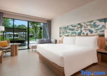 Двухместный номер Premium с видом на бассейн двуспальная кровать в Le Méridien Phuket Mai Khao Beach Resort