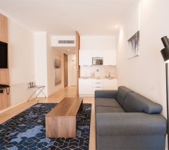 Люкс "Гранд" (Апартамент с 1 спальней) в Кортъярд Марриотт Сочи Красная Поляна