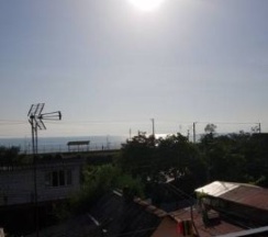 Трехместный Стандарт вид во двор частично на море (с балконом) в Диана