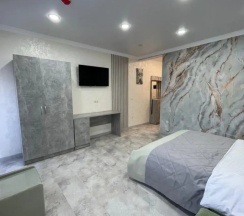 Двухместный номер Standard с балконом двуспальная кровать в Гостевой дом на Октябрьской