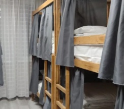 Кровать в общем номере (мужской номер) в Бонотель