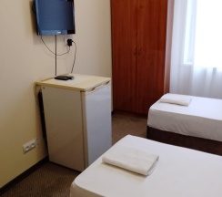 Номер полулюкс с 2 односпальными кроватями в Оптима