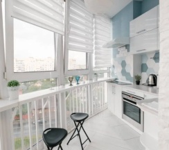 Четырёхместные апартаменты c 1 комнатой с балконом в Апартаменты Light apartment lxt.by