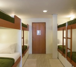 Кровать в общем номере в Brazilodge All Suites Hostel