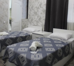 Комната стандарт с 2 односпальными кроватями в Royal Home