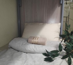 Спальное место на двухъярусной кровати в общем номере для женщин в Okayhostel