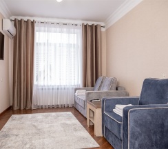 Двухкомнатный номер с двумя раздельными  кроватями в Великий Каспий