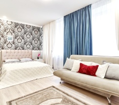 Четырёхместные апартаменты с балконом и с видом на город в Апартаменты Проспект Независимости 52