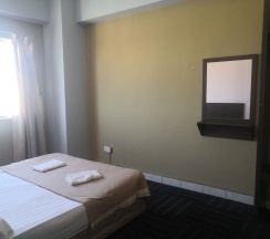 Трёхместные семейные апартаменты с видом на океан в Globallon Hotel Apartment