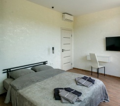 Четырёхместные апартаменты с 3 комнатами с балконом в Валентина