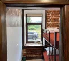 Кровать в 2-местном общем номере №4 в Стрежень