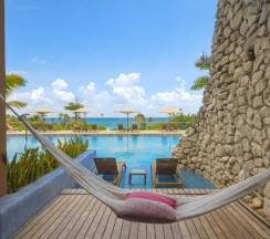 Двухместный Swim Up Adults oceanfront (двуспальная кровать) в Отель Xcaret Mexico	