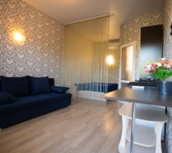 Четырёхместный номер Standard с балконом в Singer