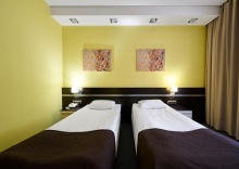Супериор двухместный с раздельными кроватями с видом на лес в Парк Отель Фристайл Роза Хутор AZIMUT