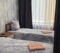 Номер стандарт с 2 односпальными кроватями (удобства на этаже) в Постоялый двор