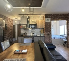 Апартаменты c 1 комнатой с балконом и с видом на город в Квартира в центре Loft