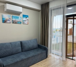 ПОЛУЛЮКС с патио и видом на море в Santorini Family Club