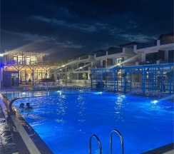 ПОЛУЛЮКС с патио в Santorini Family Club