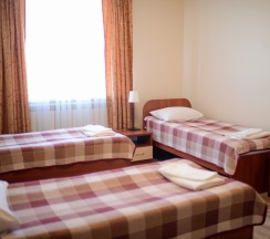 Трехместный номер с 3 односпальными кроватями в Вояж