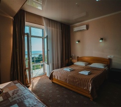 2-комнатный номер стандарт с 1 односпальной и 1 двуспальной кроватью в Анапа