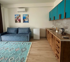 ПОЛУЛЮКС с патио в Santorini Family Club