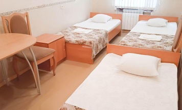 Кровать в 3-местном общем номере в Smart Hotel KDO Киров