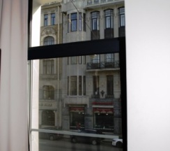 Кровать в женском четырехместном номере в Танский