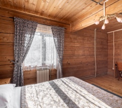 Шестиместный коттедж Богатырский с балконом в Ателика Улиткино