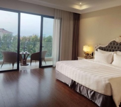 Двухместный номер Deluxe с балконом и с видом на сад 2 отдельные кровати в Отель Wyndham Grand Phu Quoc