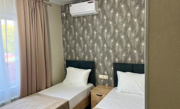 Комната люкс с 2 односпальными кроватями в Южный вайб
