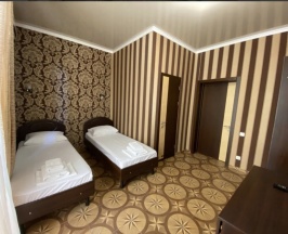 Двухместный номер с двуспальной кроватью в Ахиллес