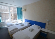 Трехместный номер с ТВ в ID Hostel