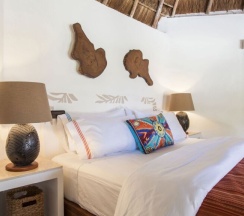 Номер Palapa с видом на сад в Shangri-la Caribe Beach Village Resort