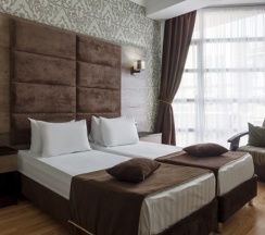 Стандарт с видом на бассейн с креслом в Pontos Family Resort Hotel