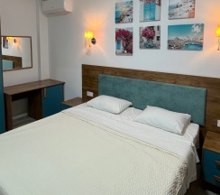 Семейный люкс SANTORINI с видом на море в Santorini Family Club