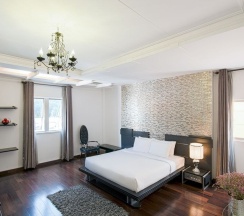 Одноместный люкс двуспальная кровать в A&EM - The Petit Hotel