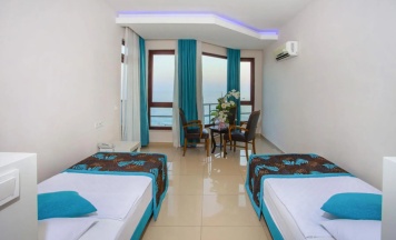 Номер семейный с видом на море в Kleopatra Ada Beach Hotel