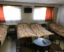 Кровать в 4-местном общем номере в Аура