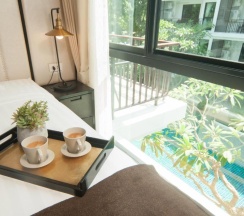Люкс c 1 комнатой с видом на бассейн в The Title KR Beach Condotel Rawai Phuket