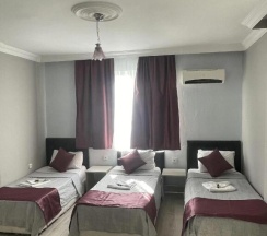 Четырёхместный номер Standard в Ersoy Ağa Otel Pansi̇yon