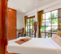 Двухместное бунгало Deluxe с видом на сад двуспальная кровать в Club Bamboo Boutique Patong Beach Resort