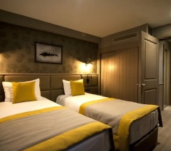Четырёхместный полулюкс семейный (пристройка) в Seraglio Hotel & Suites