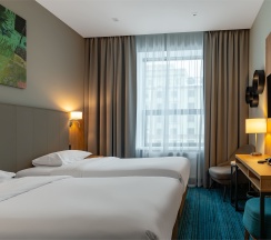 Стандартный номер с видом на город c двумя односпальными кроватями в Cosmos Omsk Hotel