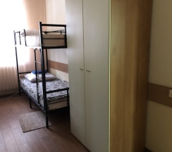 Кровать в общем номере в Домино