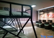 Кровать в общем номере в The Jomtien Twelve