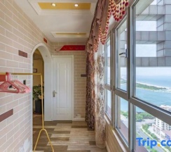 Двухместный люкс с видом на море двуспальная кровать в Rizhao Shuohai Seaview Homestay (Wanpingkou Branch)